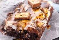 Ultimate Snickers Poke Cake