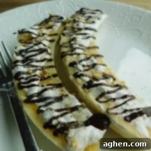 Delicious 2-Point Banana S'mores on a white plate, ready to eat