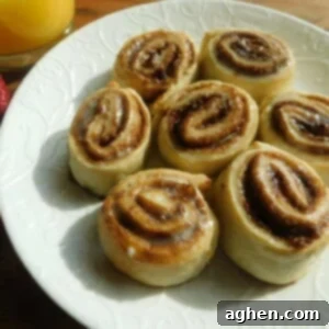 Weight Watchers two-ingredient dough cinnamon rolls, glazed and stacked