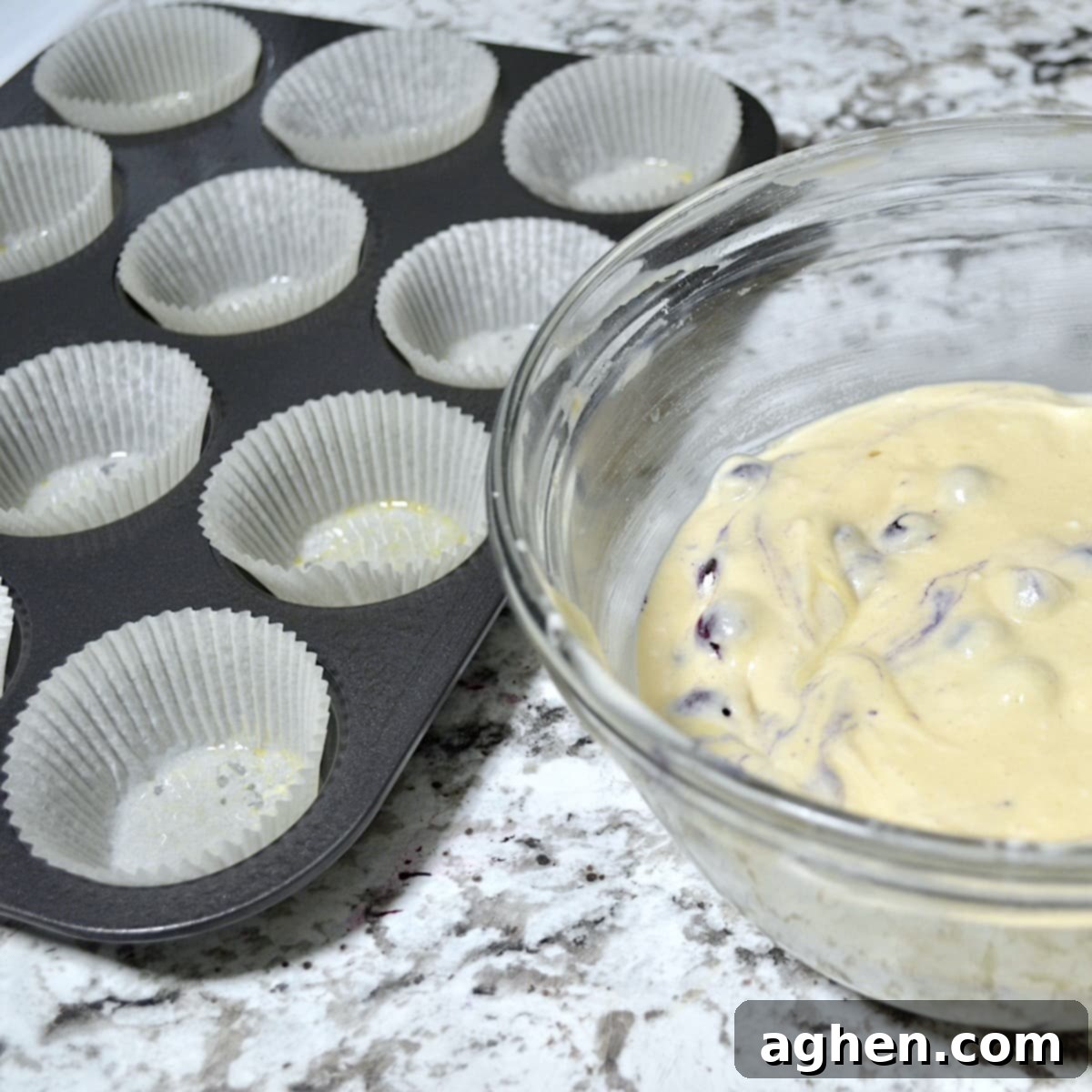 Blueberry muffin batter and muffin tray