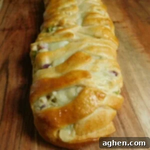 weight watchers croissant loaf on wooden cutting board