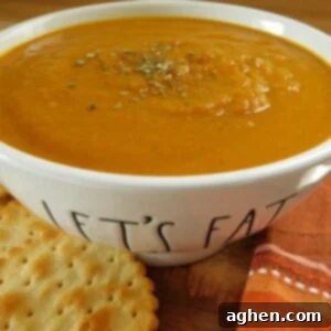 Velvety Pumpkin Carrot Bisque 2 Creamy Roasted Pumpkin and Carrot Soup in a bowl