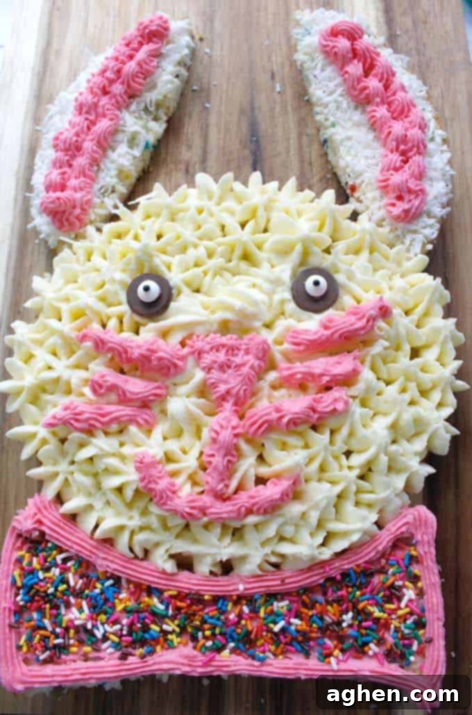 Easter Bunny Cake decorated with frosting and sprinkles.