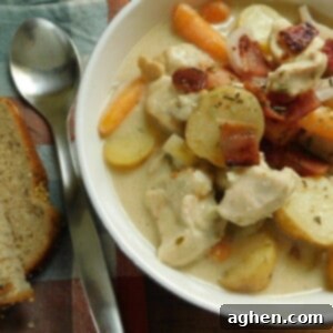 Hearty Slow Cooker Chicken Stew 2 Creamy Slow Cooker Chicken Stew in a white bowl, ready to serve.