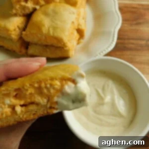 A plate of perfectly baked Buffalo Chicken Squares, ready for serving.