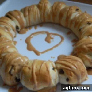Simple 3-Ingredient Crescent Treats 2 Finished chocolate peanut butter crescent bites arranged beautifully on a plate.