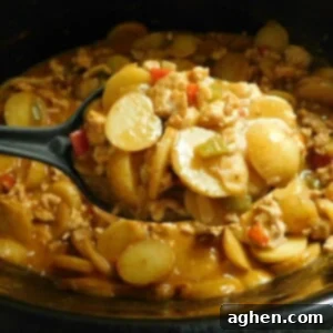 Taco Tater Bake 2 Taco Potato Casserole in a slow cooker.