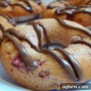 Close-up of a Strawberry Nutella Donut with fresh strawberries