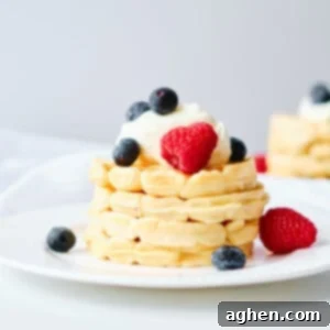 Power-Packed Waffle Bites 2 Fluffy mini protein waffles with a side of mixed berries