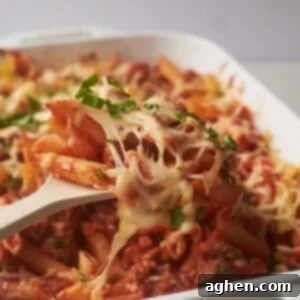 Close-up of baked cheesy turkey penne pasta