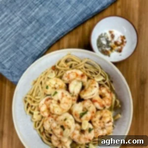 Skinny Shrimp Scampi 8 shrimp scampi in pasta bowl with small bowl of spices
