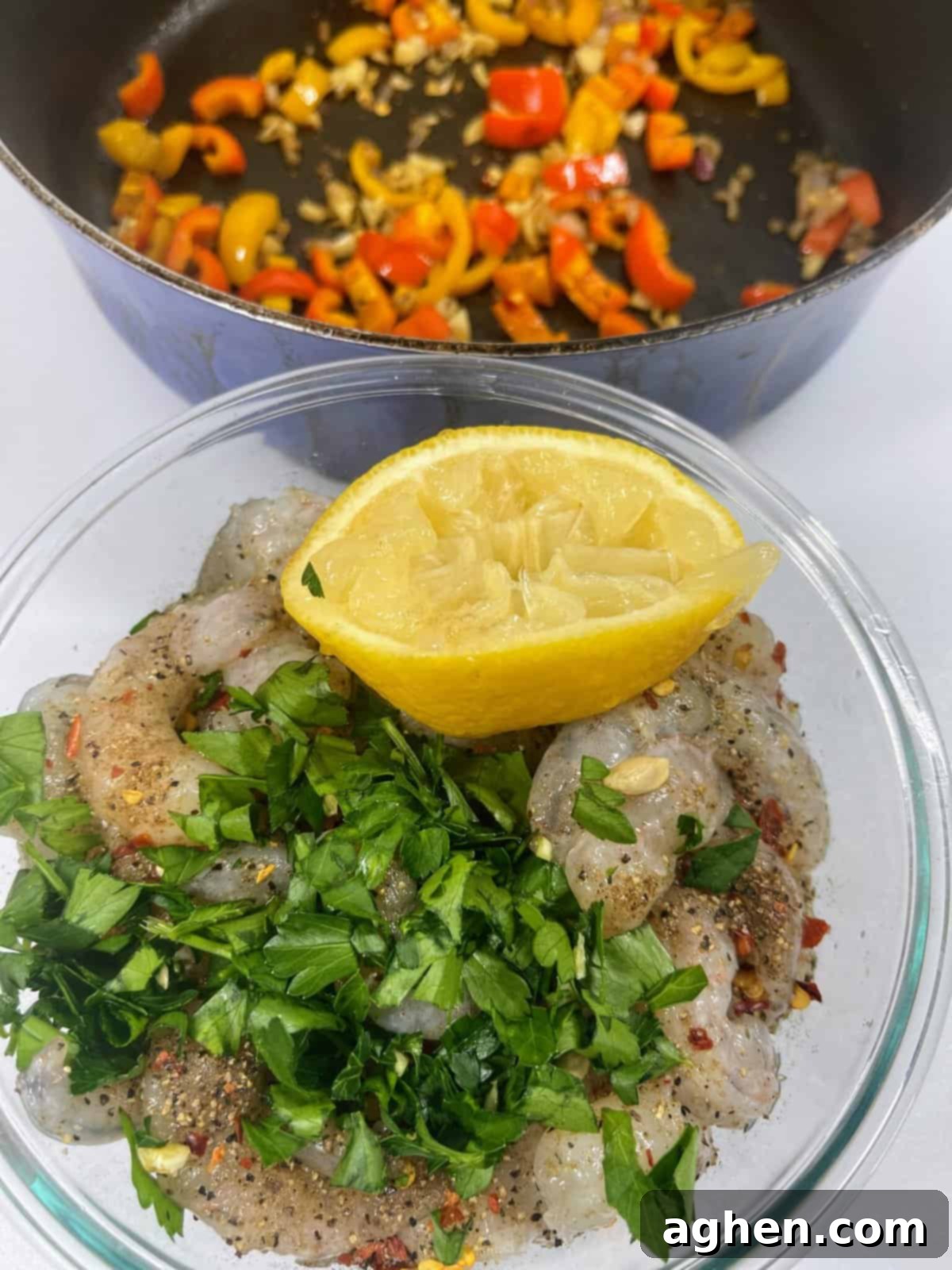 Guilt-Free Southern Delight Weight Watchers Shrimp and Grits 6 Raw shrimp with parsley seasoning and lemon in a bowl