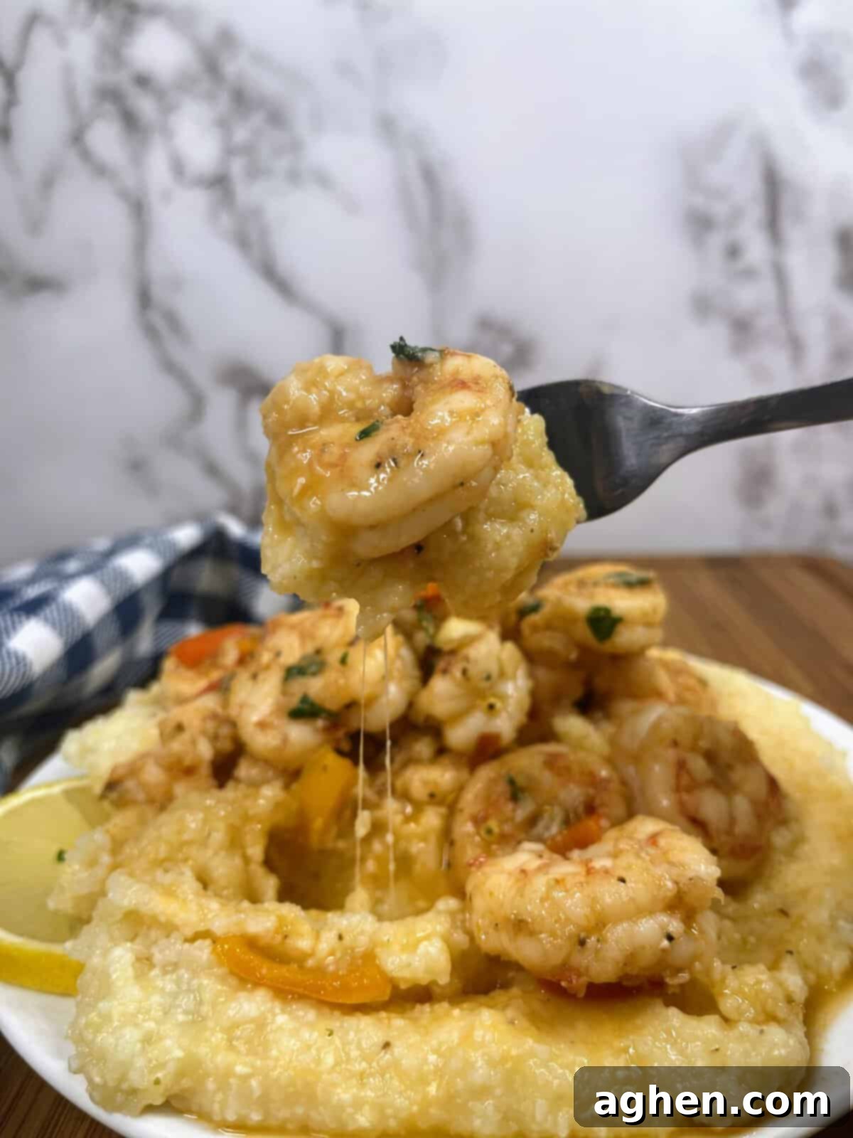 Guilt-Free Southern Delight Weight Watchers Shrimp and Grits 7 Cooked shrimp and grits on a fork