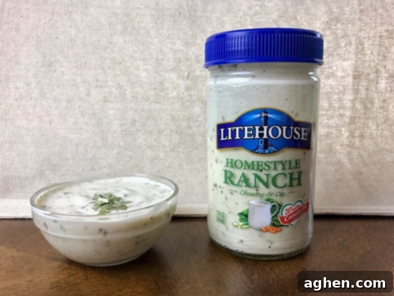 A pristine glass jar of Litehouse Homestyle Ranch Dressing, showcasing its creamy texture and fresh appeal, highlighting its role as the essential base for this easy dip recipe.