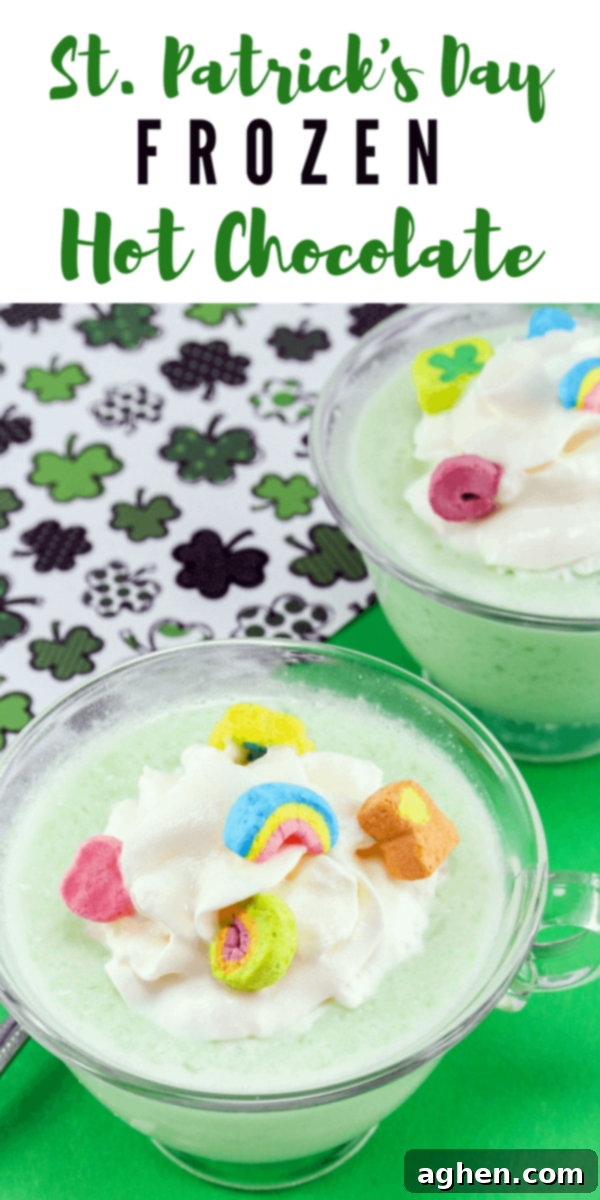 Frozen green drink with whipped cream and lucky charms marshmallows on top.