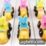 Peeps Twinkie Cars with Necco wafer steering wheels and licorice tires.