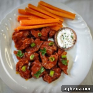 Fiery Vegan Buffalo Wings 2 Vegan buffalo wings on white plate