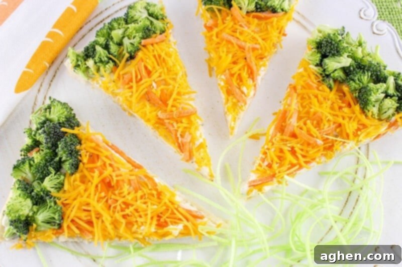 Broccoli and carrot pizza Easter snack for kids, beautifully presented on a wooden board. A delightful and healthy option for celebrations.