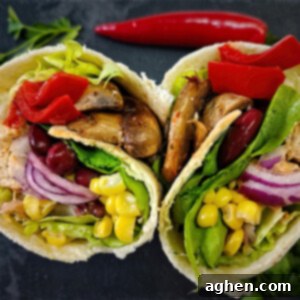 The Vegan Burrito That Will Blow Your Mind 2 delicious vegan burrito on black cutting board