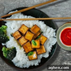General Tso's Tofu on black plate
