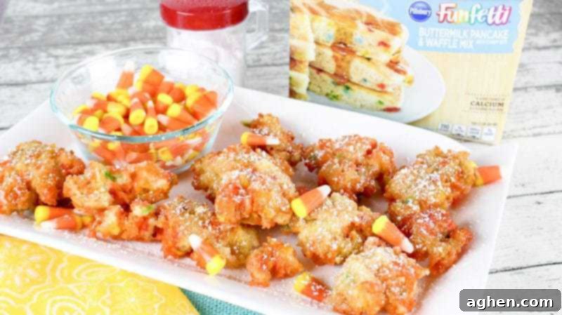 Funfetti Fried Candy Corn Bites 4 Funfetti Fried Candy Corn is an over-the-top delicious recipe perfect for Halloween or for using up leftover Halloween candy.