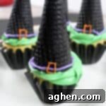 Spooky Witch Hat Cupcakes 13 Witch hat cupcakes with upside-down ice cream cones.