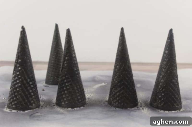 Spooky Witch Hat Cupcakes 9 Black sugar cones sprayed black and drying.