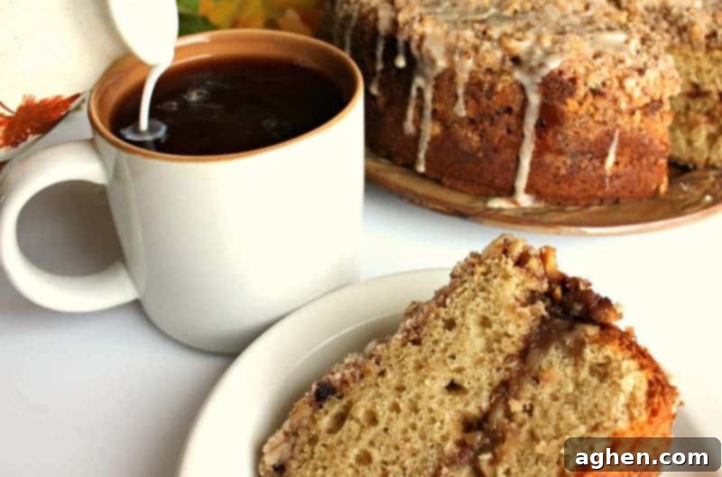 Close-up of the crumbly streusel topping and maple icing on a Maple Walnut Coffee Cake.