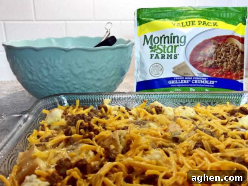 The assembled cheesy vegetarian overnight breakfast casserole, ready for refrigeration.