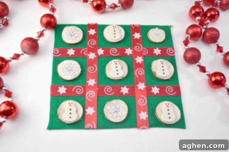 Finished DIY Christmas Tic Tac Toe board game packaged as a gift with a ribbon.