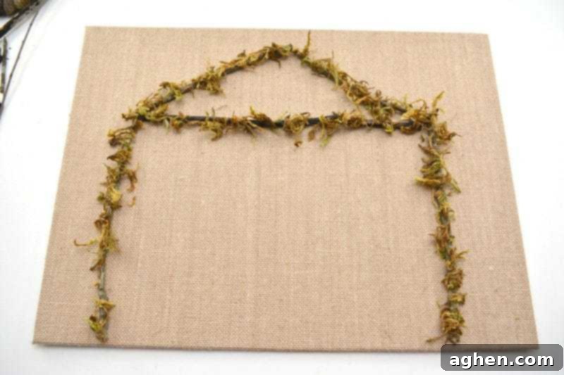Twigs glued in place, ready for moss.