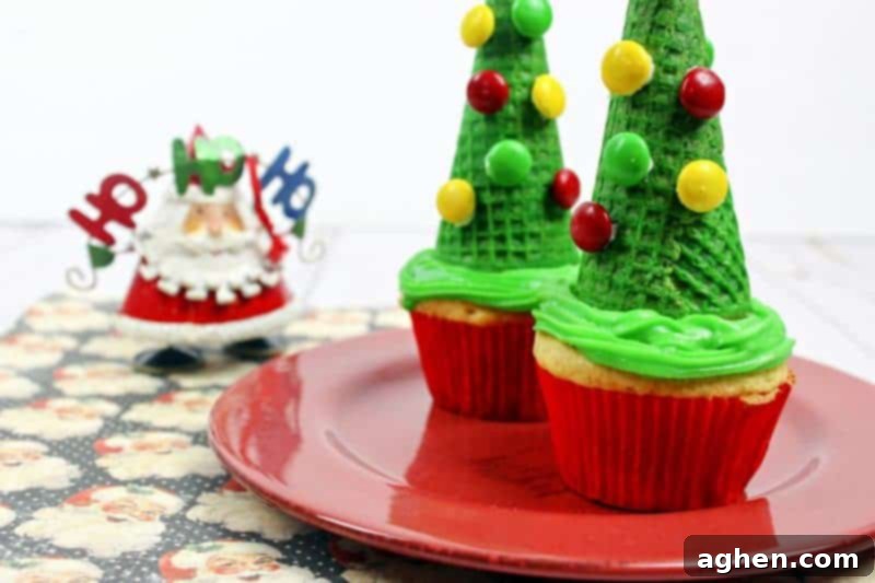 Kids love decorating these simple Christmas tree cupcakes, topping frosted cupcakes with green-sprayed sugar cones and M&M candies.