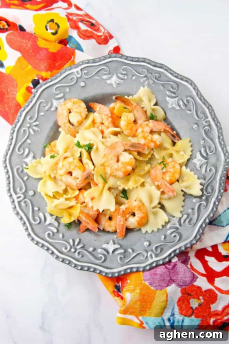 This delicious and simple instant pot shrimp scampi recipe takes minutes to make and can be served over pasta or rice for a quick and tasty dinner.