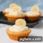 A small, square image of a banana cream cookie cup, perfect for social media sharing.