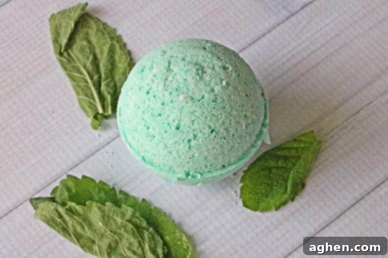 A collection of perfectly formed homemade headache bath bombs, enriched with calming lavender and invigorating peppermint essential oils, displayed to showcase their natural beauty and therapeutic potential.