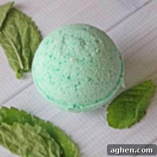 A finished DIY Headache Bath Bomb recipe card image, ready to bring soothing relief with lavender and peppermint essential oils.