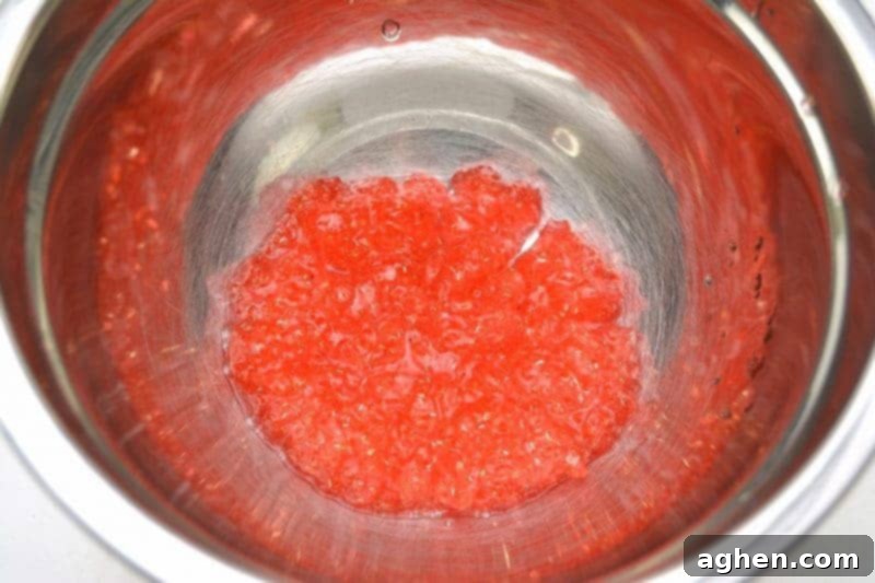 Combine Borax mixture with glue mixture to form Valentine Slime.