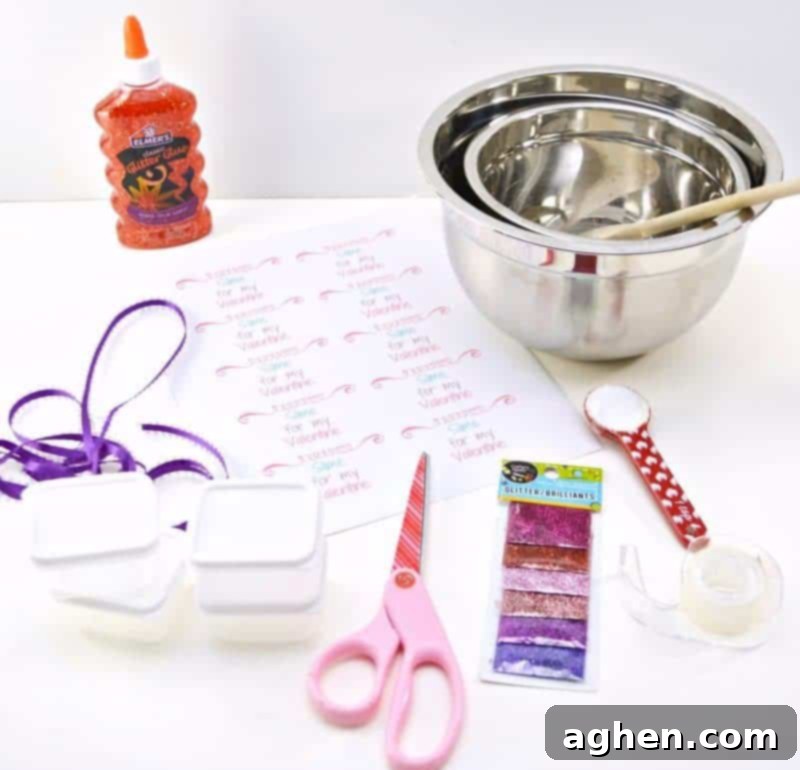 Valentine Slime supplies including red glitter glue, Borax, mixing bowls, and small containers. Perfect for an easy DIY Valentine craft.