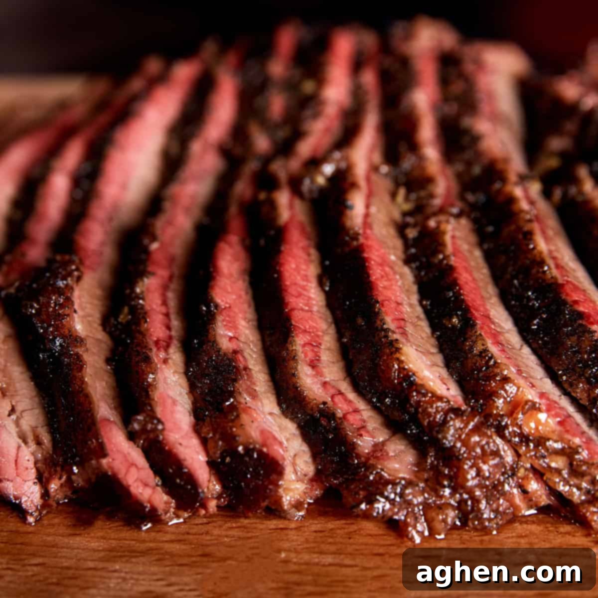 The Big Green Egg Brisket Recipe I Cant Stop Making 2 Texas Brisket sliced on wooden cutting board