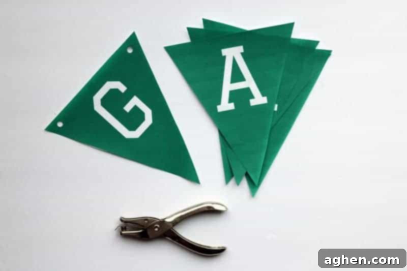 Step-by-step image showing how to cut out the Game Day banner triangles for assembly.
