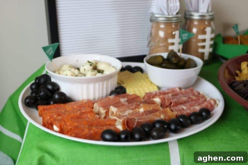 A diverse and appetizing spread of food, including a charcuterie board and various appetizers, perfect for entertaining during the Big Game.