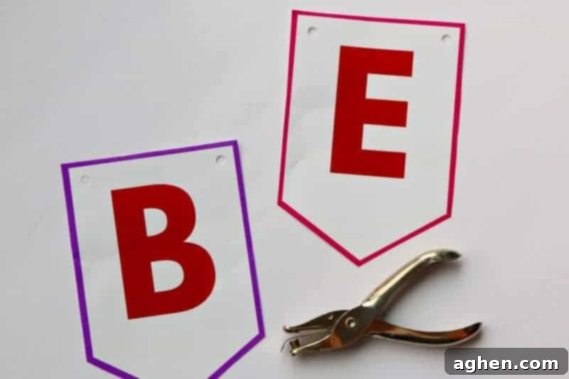 Punching holes in the corners of each "Be Mine" letter flag for easy banner assembly.