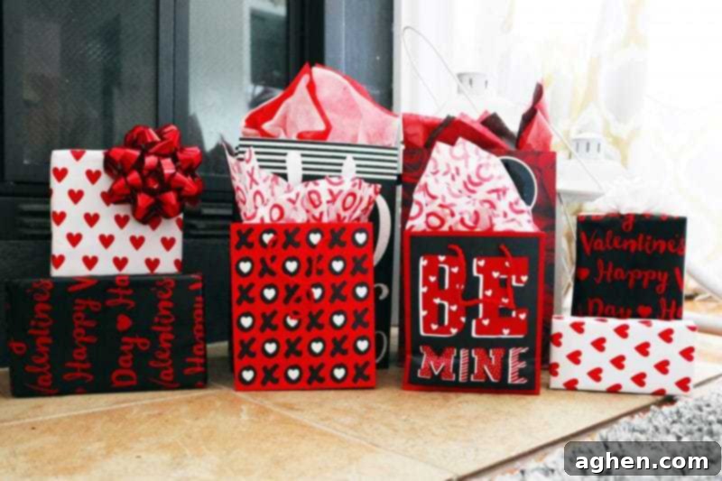Elegantly wrapped Valentine's Day presents with festive bows and ribbons, ready for gifting.