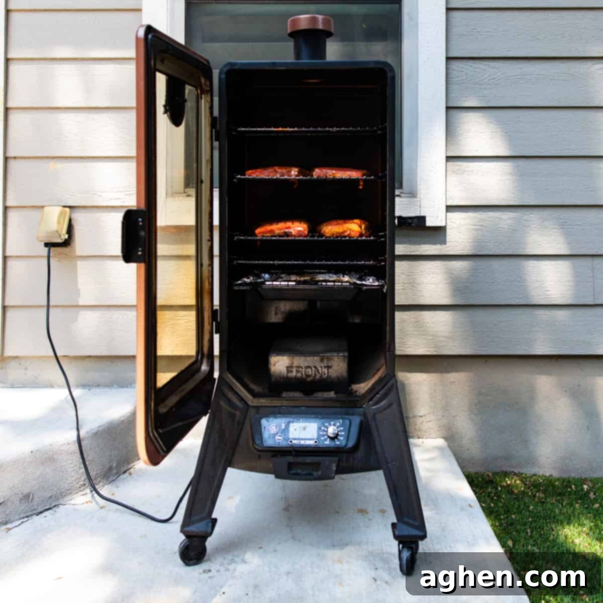 upright smokers with ribs cooking