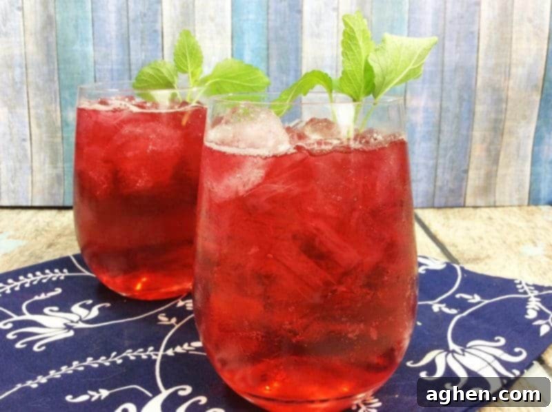 Homemade Iced Passion Tea Lemonade, a refreshing blend of sweet passion tea and tart lemonade with a hint of vanilla, perfect for a summer day or any time you need a delicious pick-me-up.