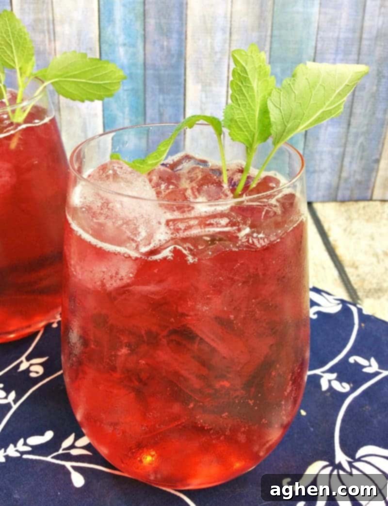 Simple to make, homemade Iced Passion Tea Lemonade brings the sweet and tart flavors of passion tea and lemonade together, enhanced with a hint of vanilla. A perfect DIY Starbucks copycat drink for any occasion.