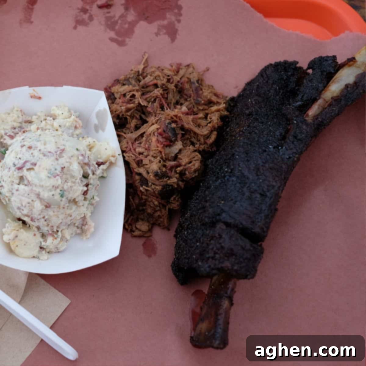 Lunch at la Barbecue: Beef rib, chopped brisket, potato salad with bacon, pickles, a classic Austin BBQ meal