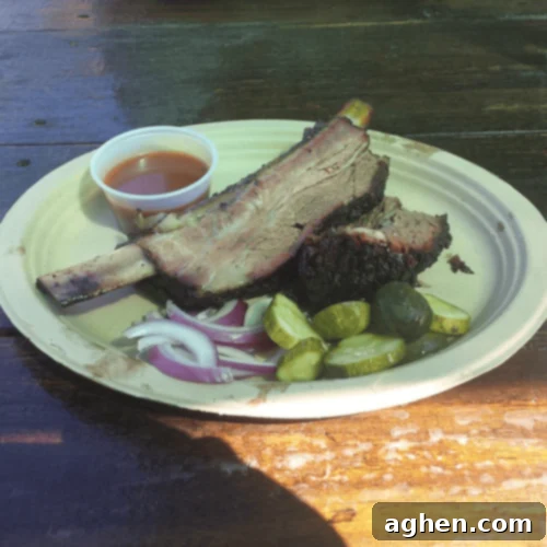 a generous 3/4 lbs beef rib and 1/4 lbs of fatty burnt end brisket, a signature dish at Micklethwait Craft Meats