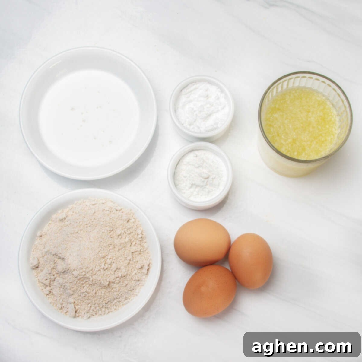 Sunshine Slice 3-Point Lemon Bars 3 Oat flour, stevia, coconut cream, eggs, lemons, lemon juice, and tapioca starch in separate dishes.