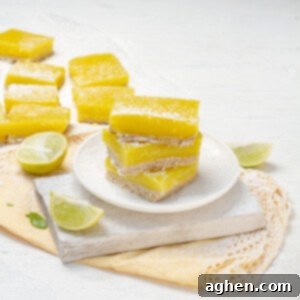 Sunshine Slice 3-Point Lemon Bars 8 Delicious, lightened-up lemon bars stacked on a plate.